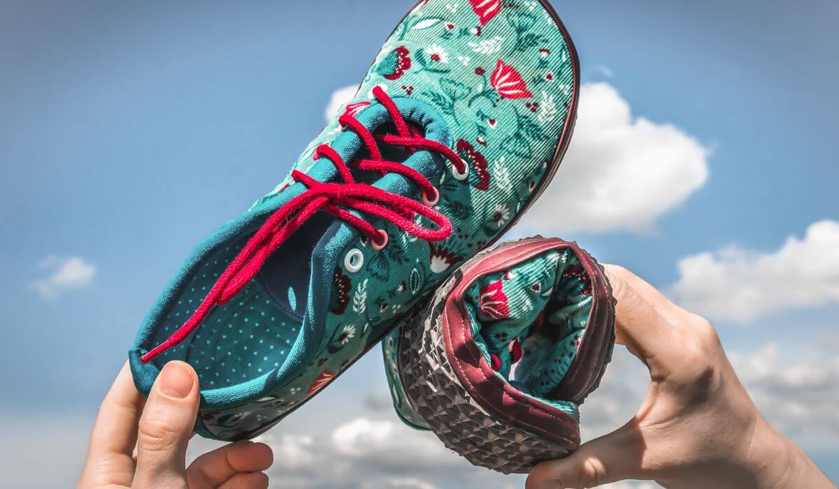 Teal floral Barefoot shoes are fun, lightweight have flexible soles.